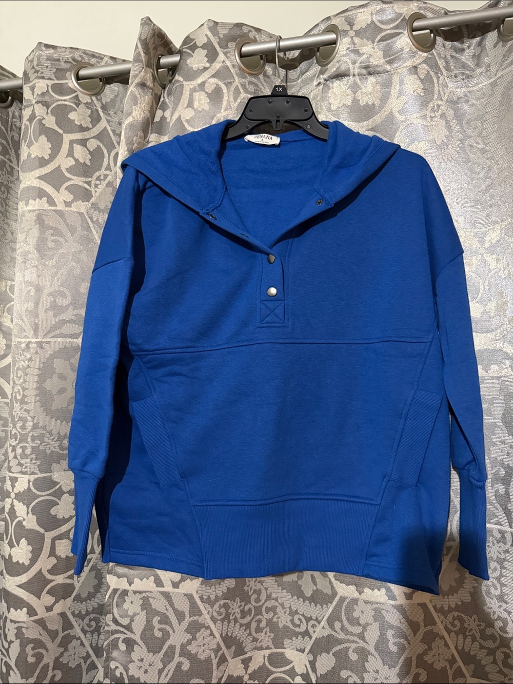 NWOT oversized blue hoodie with kangaroo pocket and snaps